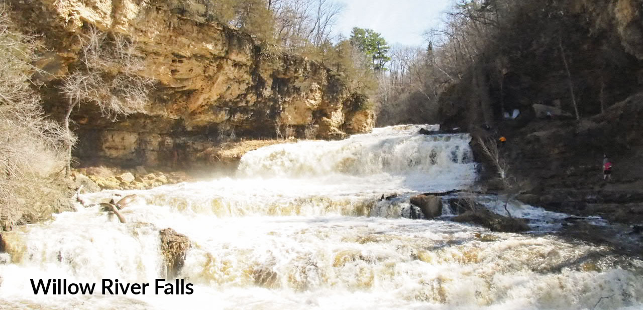 OLYMPUS DIGITAL CAMERA rapids rush through cliffs